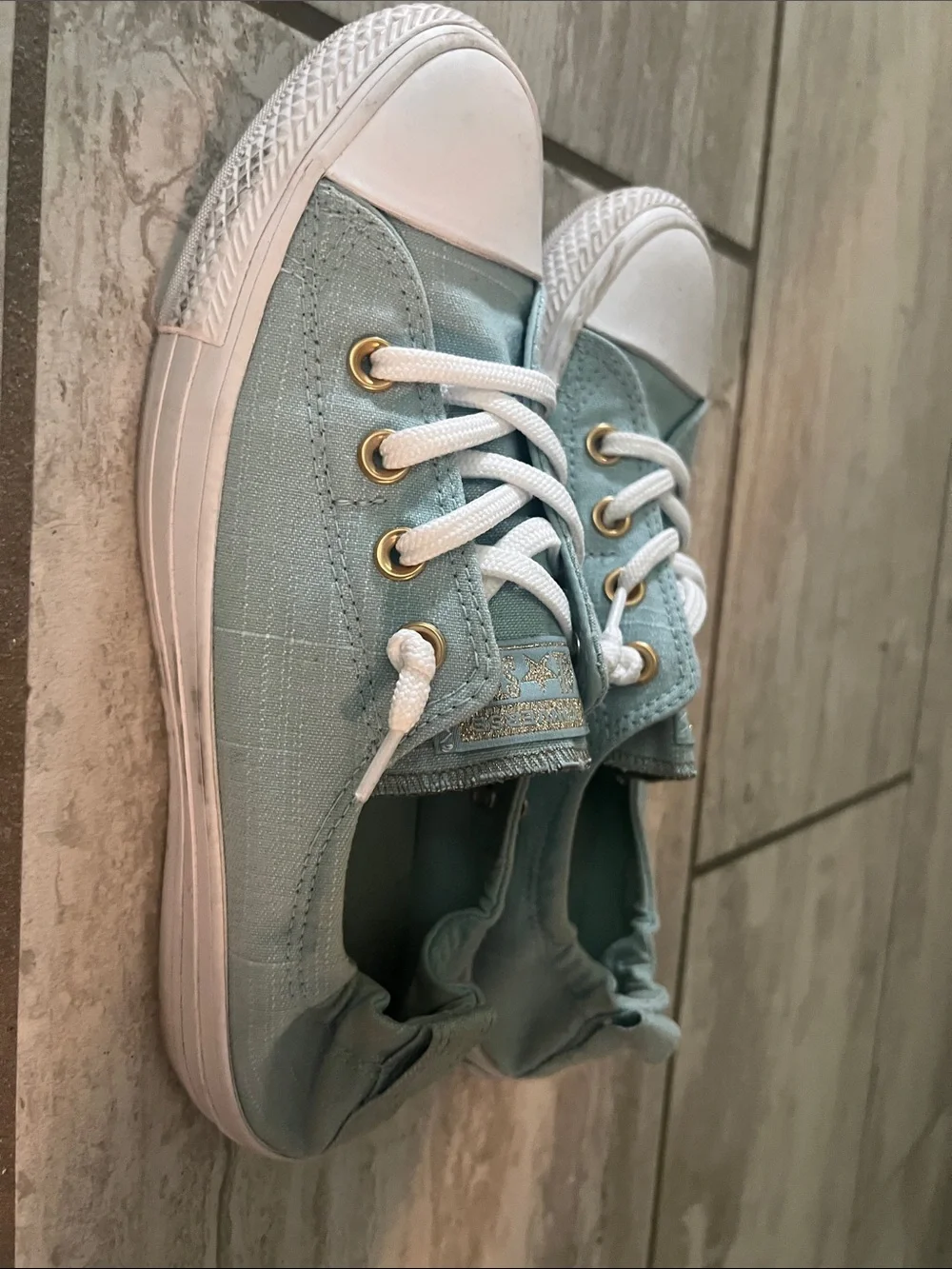 Converse Women’s Low Top Sneakers in light blue with White Accents